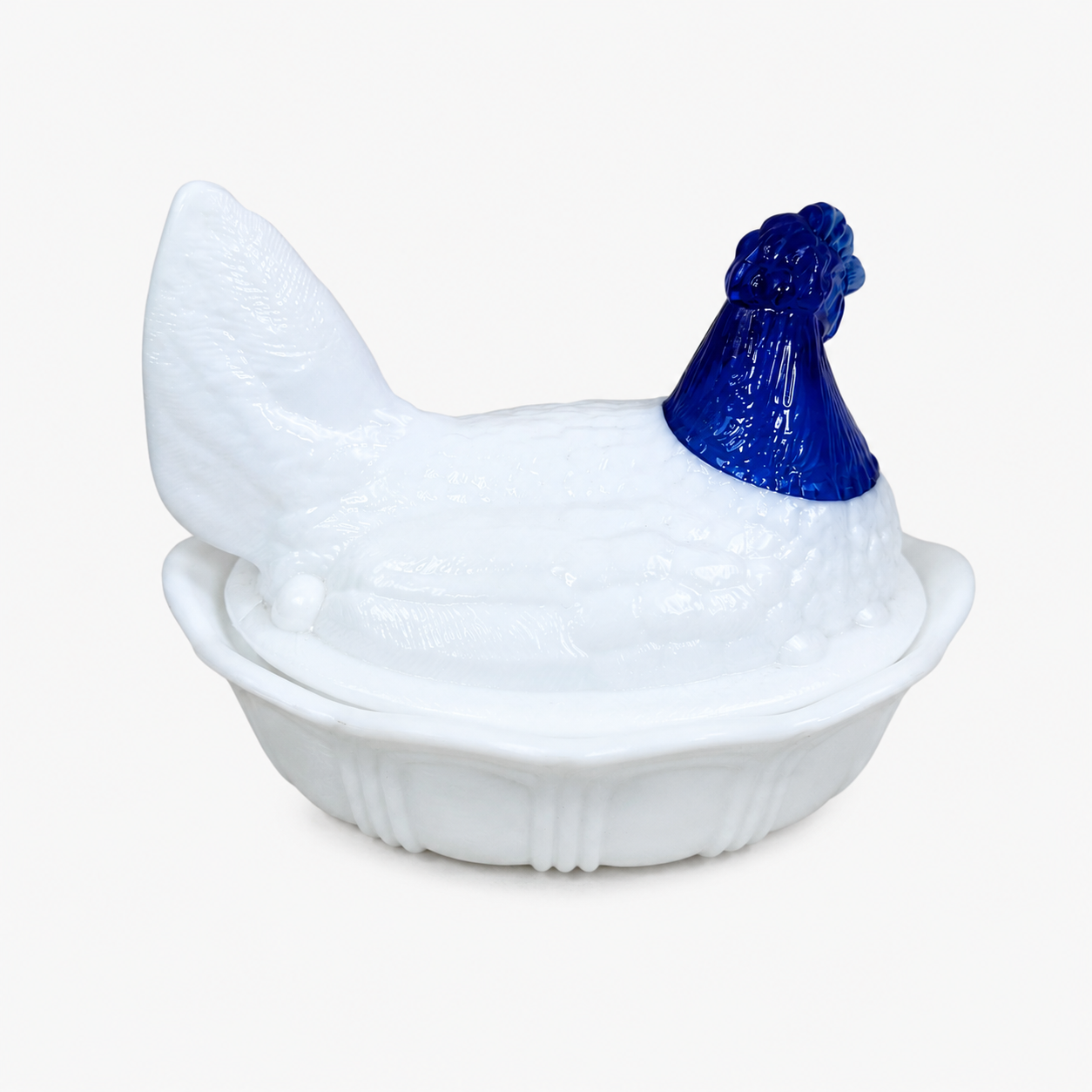Vintage Fenton covered hen dish in milk glass and cobalt blue