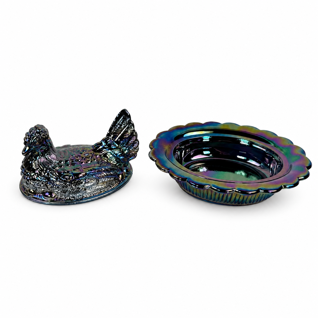 Iridescent amethyst carnival glass hen on nest by Mosser