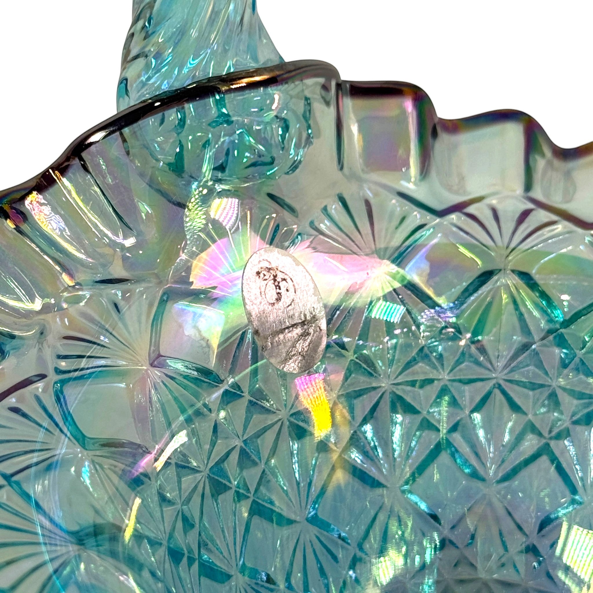 Blue iridescent Fenton basket with twisted handle and scalloped rim