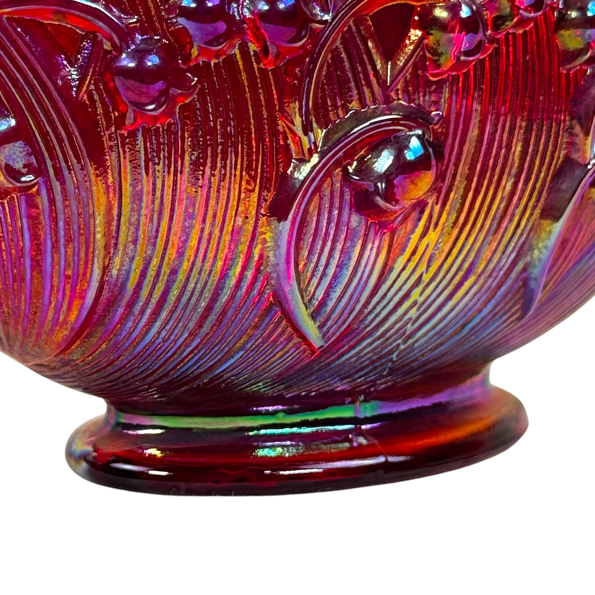 Fenton carnival glass bowl in ruby amberina with raised floral detail