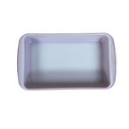 Pink Pyrex rectangular baking dish with white interior