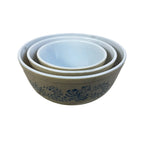Speckled beige Pyrex Homestead bowls stacked together in farmhouse style