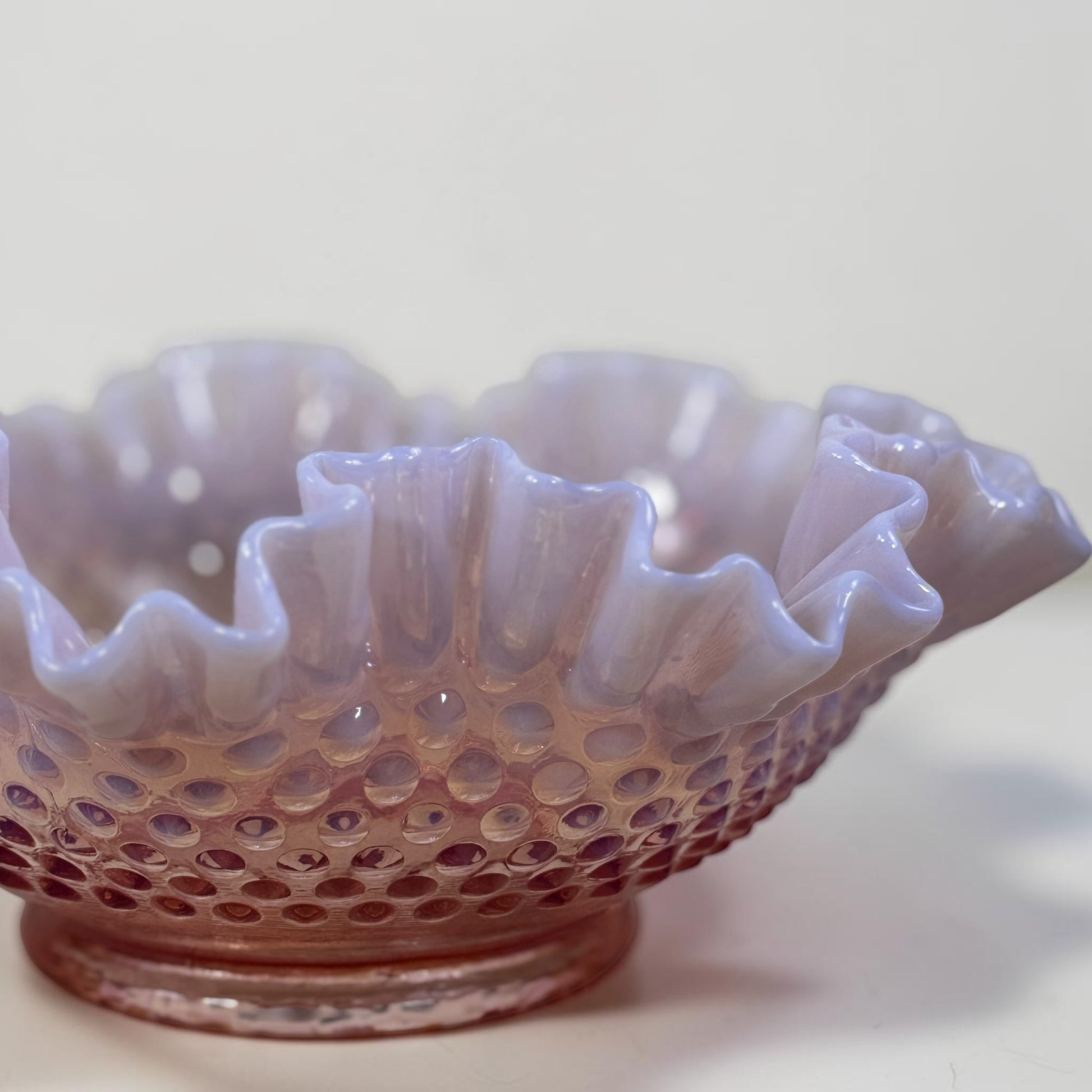 Vintage pink hobnail art glass bowl with ruffled edge