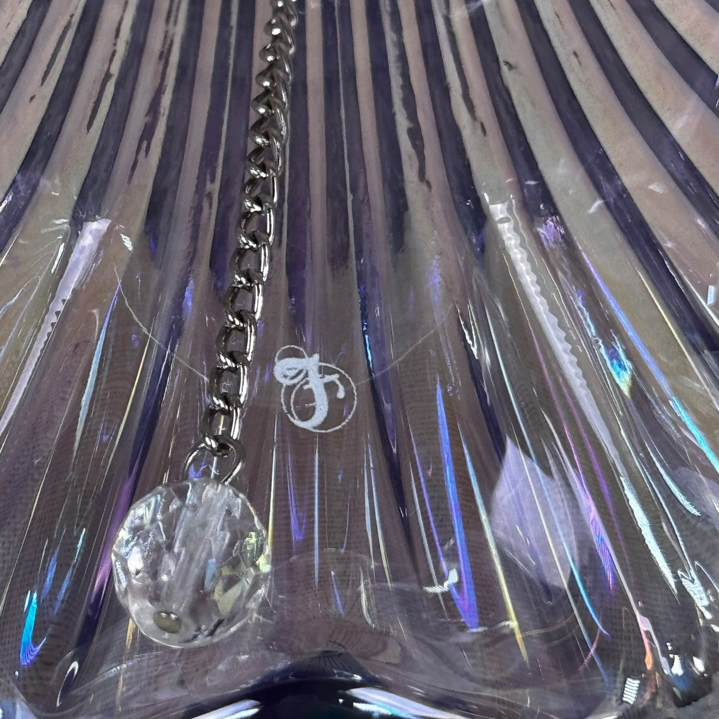 Fenton Art Glass bell in shimmering purple iridescent finish