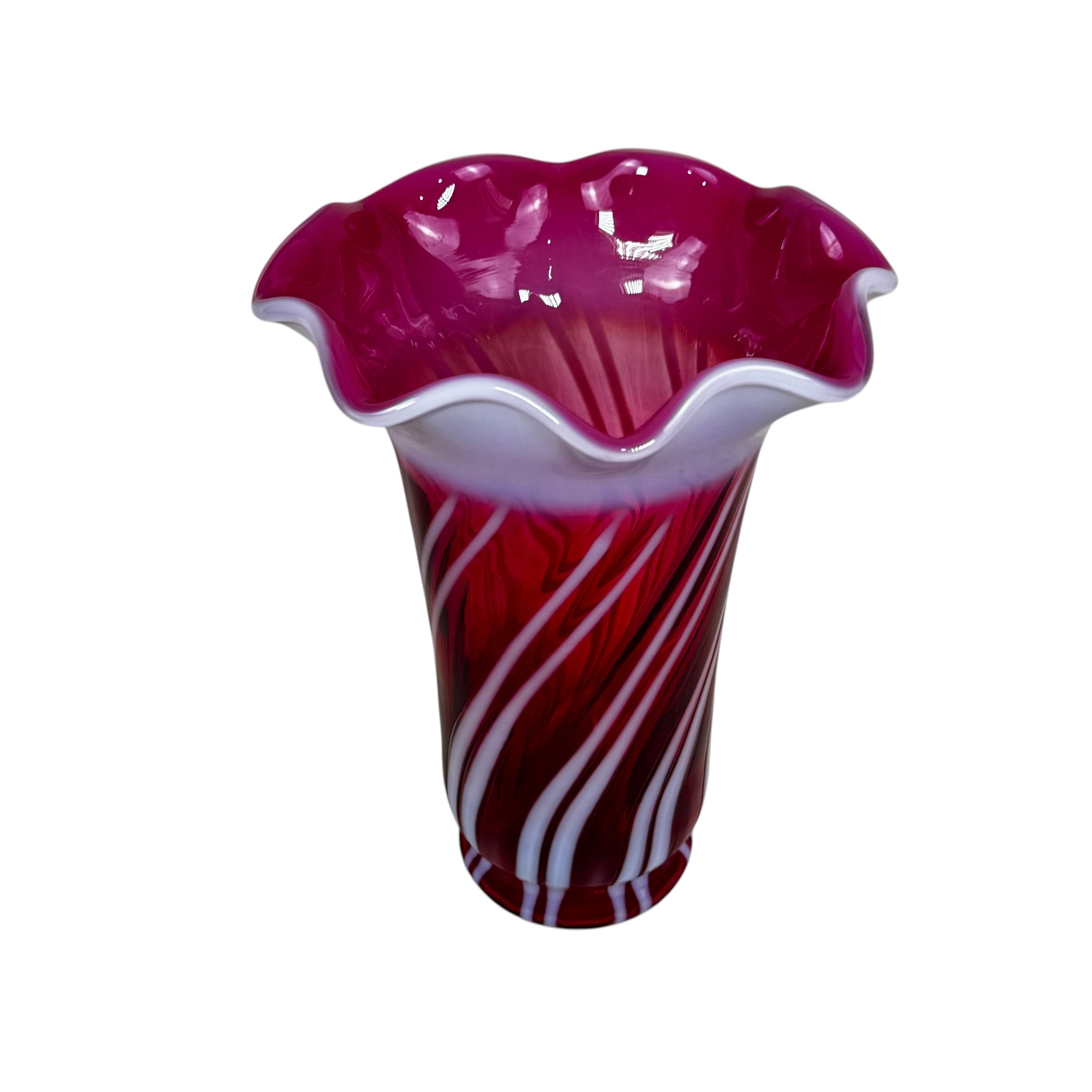Fenton art glass vase in cranberry opalescent with white spiral pattern