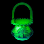 Fenton Burmese hand painted uranium glass basket with landscape scene