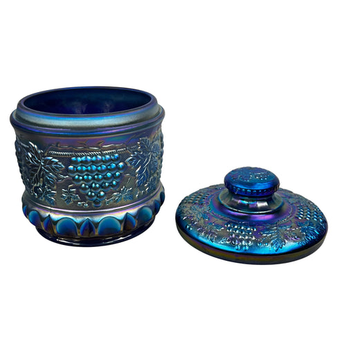 Blue iridescent Fenton covered tobacco jar with grape pattern