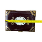 Decorative vintage jewelry storage box with brass corner mounts