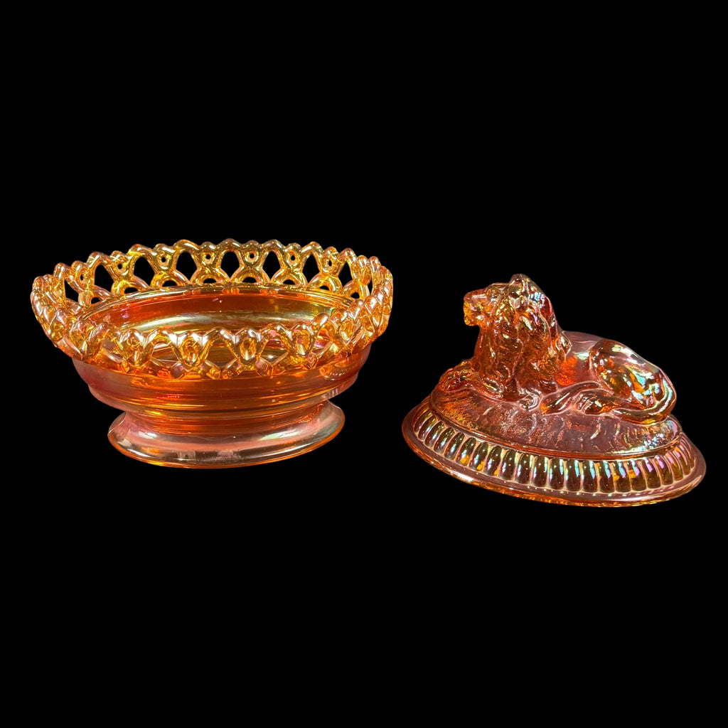 Imperial Glass lion covered dish in marigold carnival glass