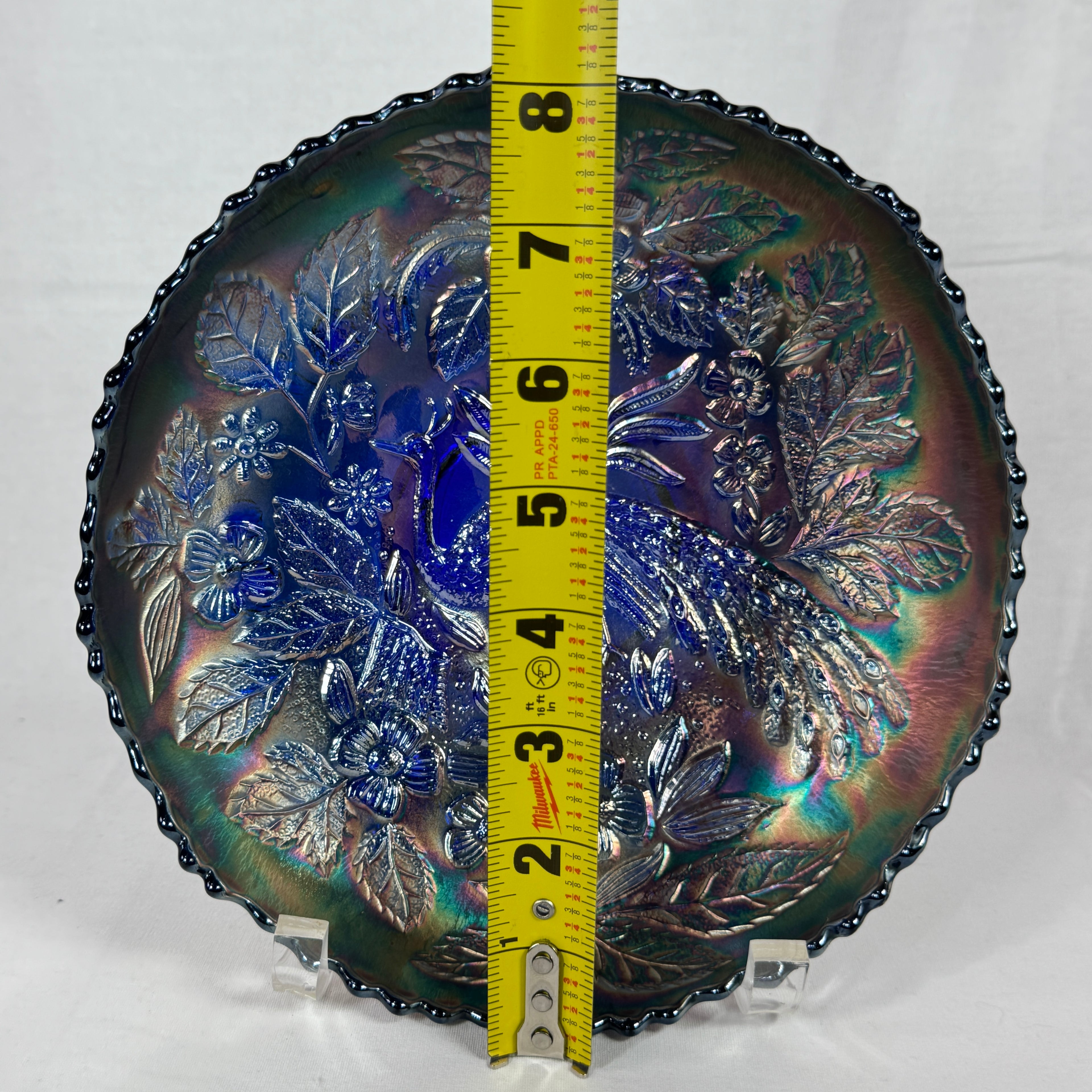 Cobalt blue Fenton carnival glass bowl with peacock pattern