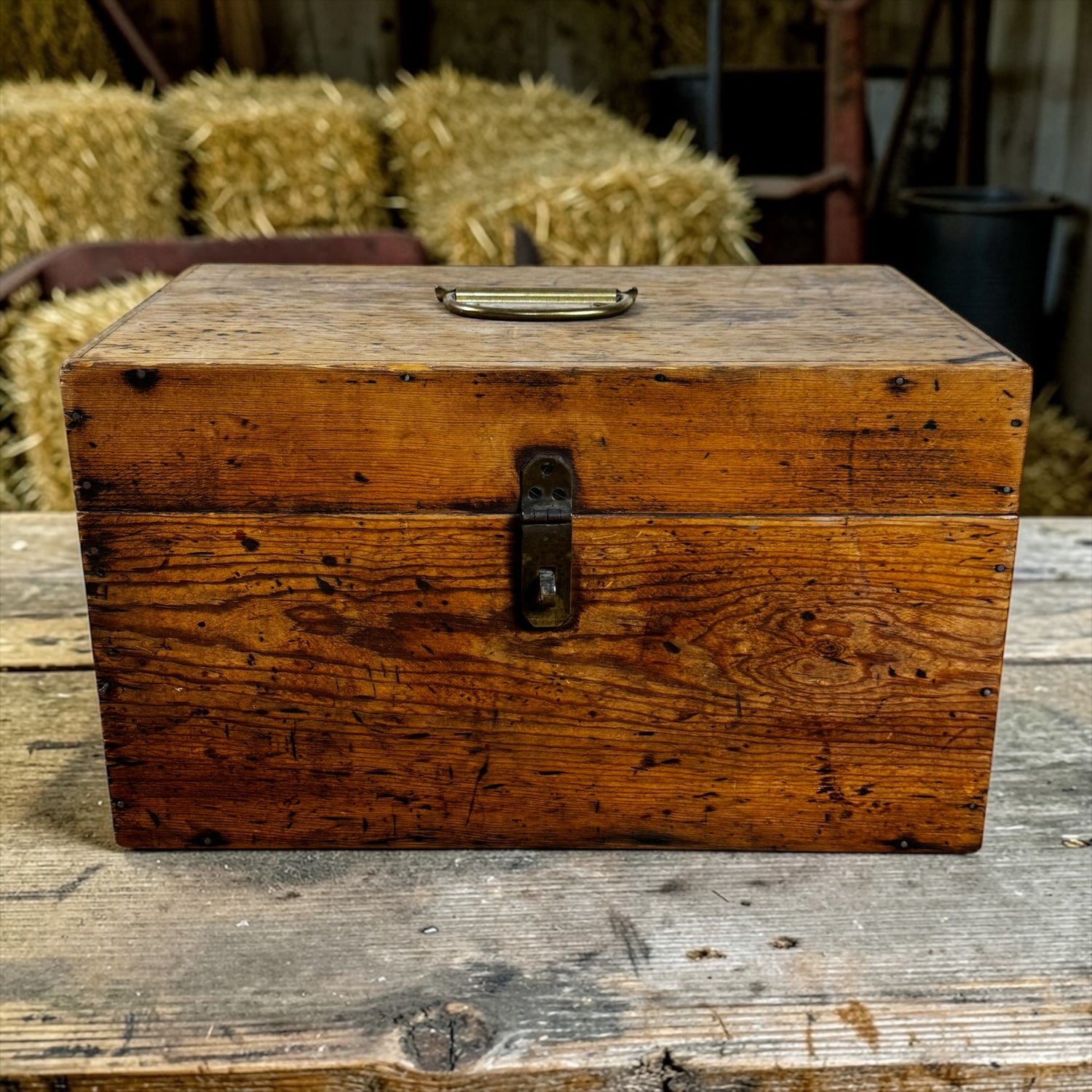 Antique primitive wooden storage chest with brass latch