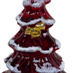 Red glass Christmas tree ornament with gold bow and snowflake details on a white background