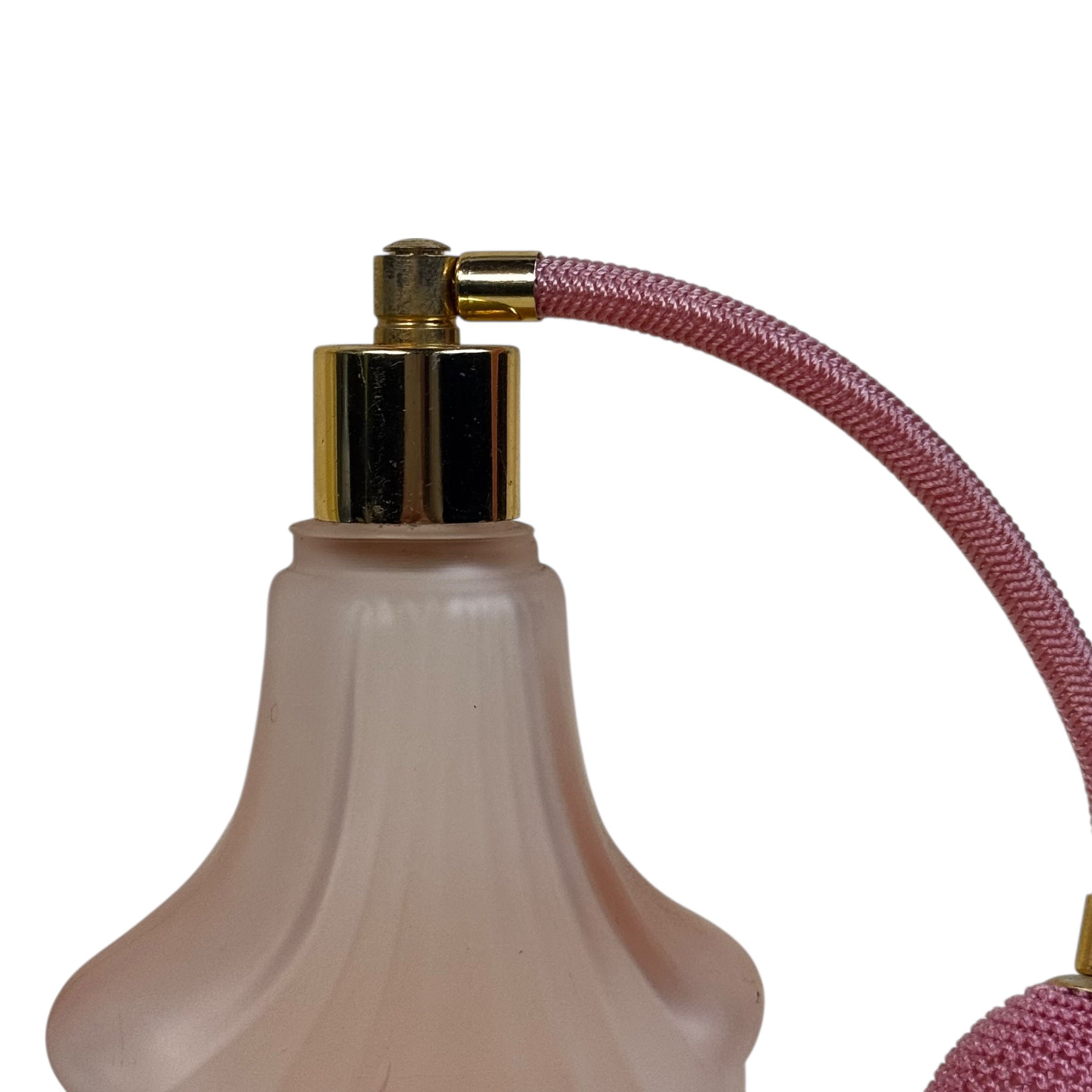 Pink glass atomizer bottle with tassel vintage perfume