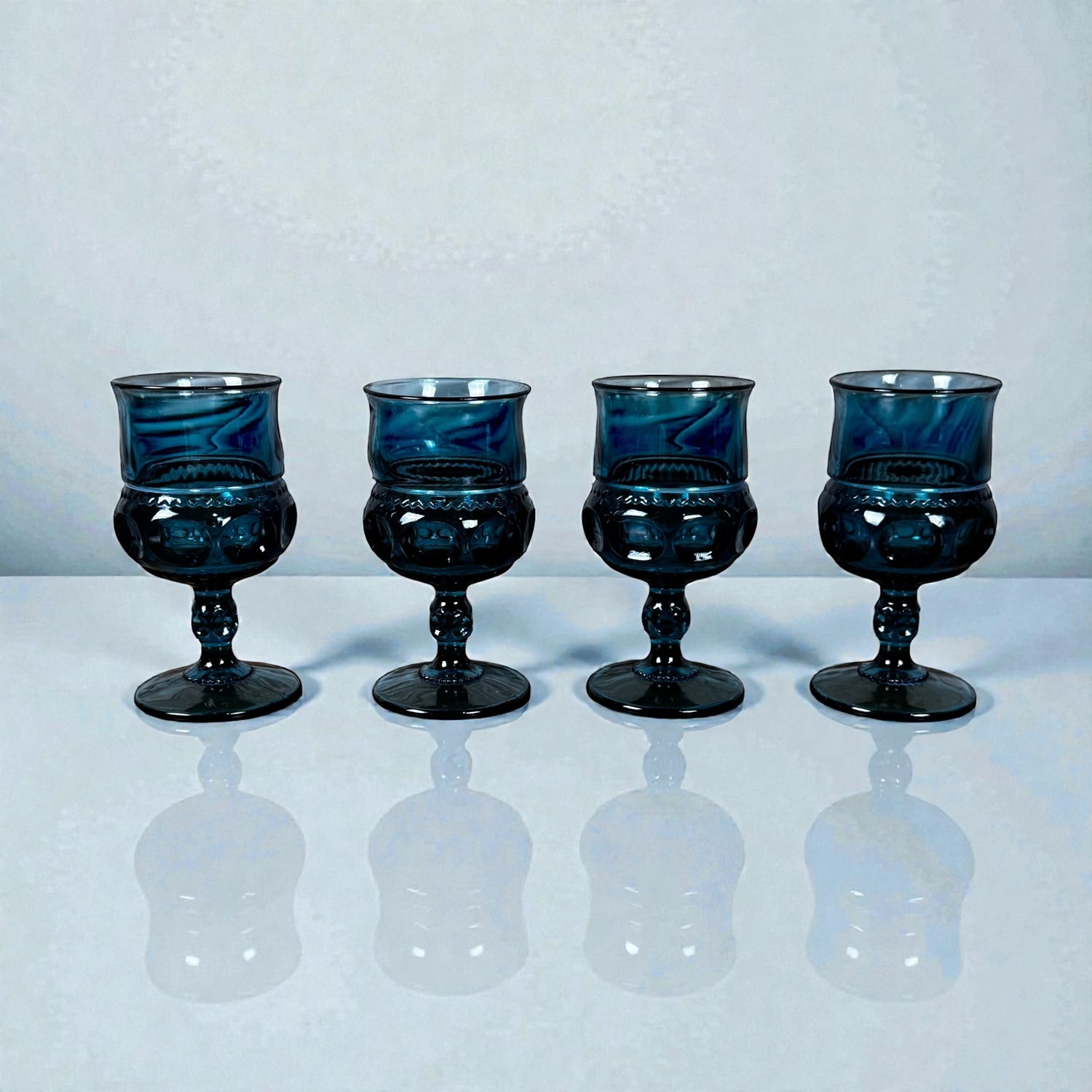 Vintage Indiana Glass Kings Crown thumbprint goblets blue set