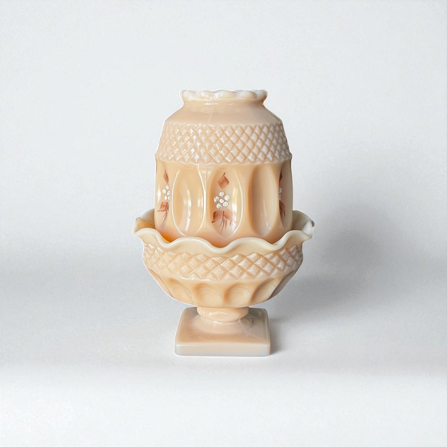 Westmoreland almond milk glass fairy lamp with pedestal base and floral decoration