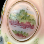 Collectible Fenton Burmese glass bell with Designer Bells tag