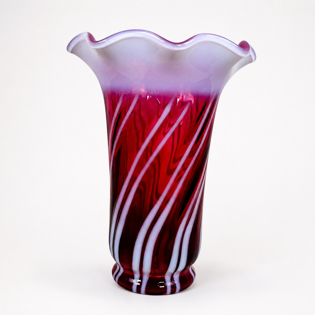 Vintage Fenton Cranberry Opalescent Spiral Optic vase with ruffled rim